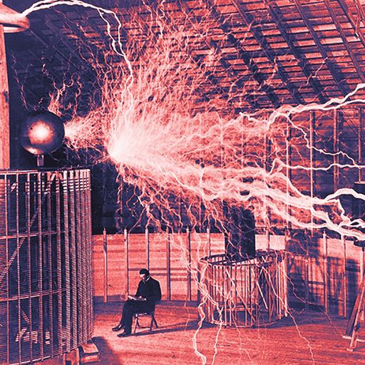 Nikola Tesla with his equipment for producing high-frequency alternating currents